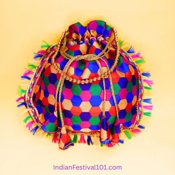 Vibrant Hexagonal Pattern Potli Bag with Golden Tassels