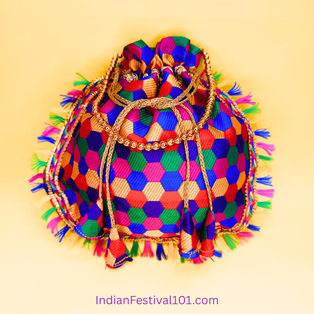 Vibrant Hexagonal Pattern Potli Bag with Golden Tassels 1 Vibrant Hexagonal Pattern Potli Bag with Golden Tassels
