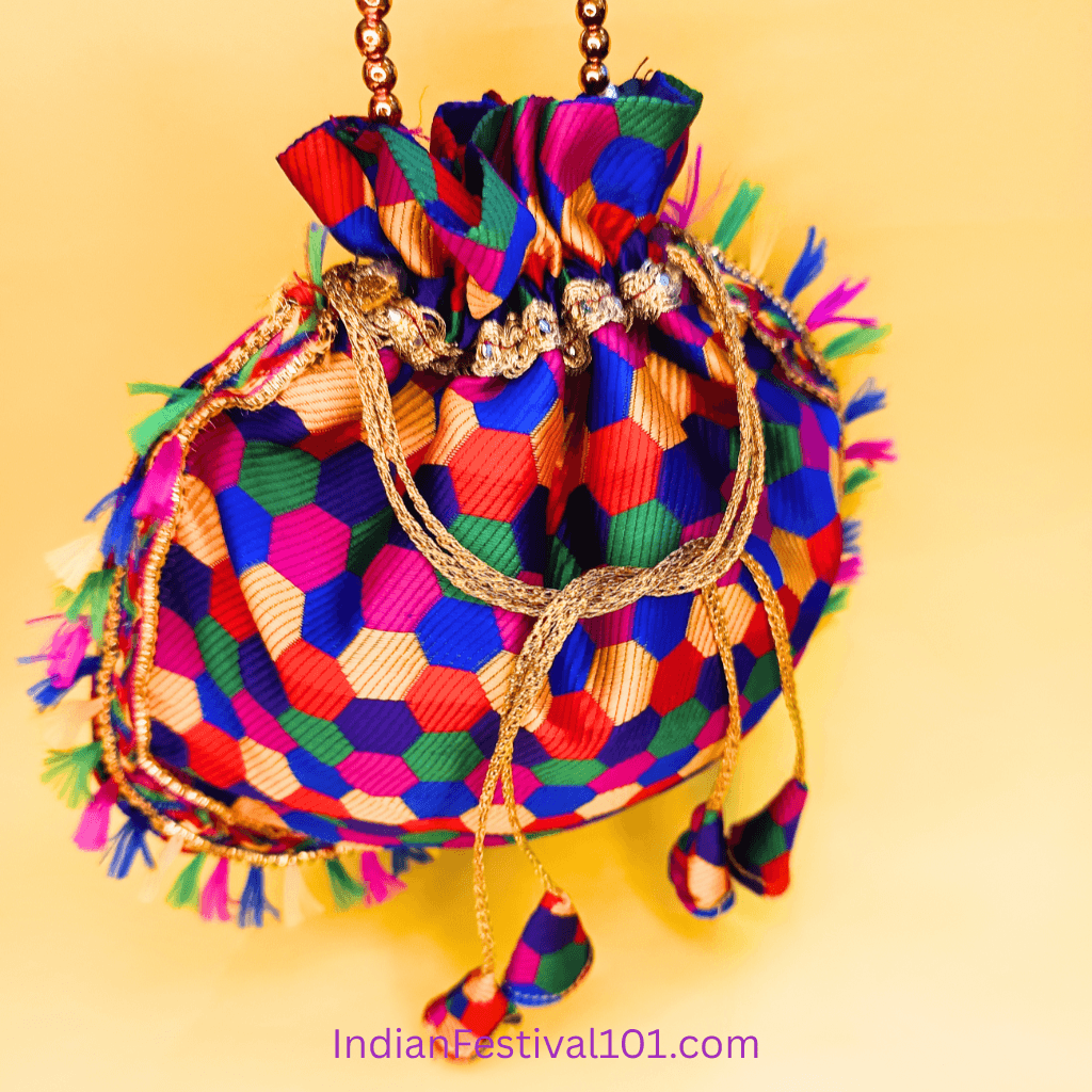 Vibrant Hexagonal Pattern Potli Bag with Golden Tassels 2 Vibrant Hexagonal Pattern Potli Bag with Golden Tassels - Image 2