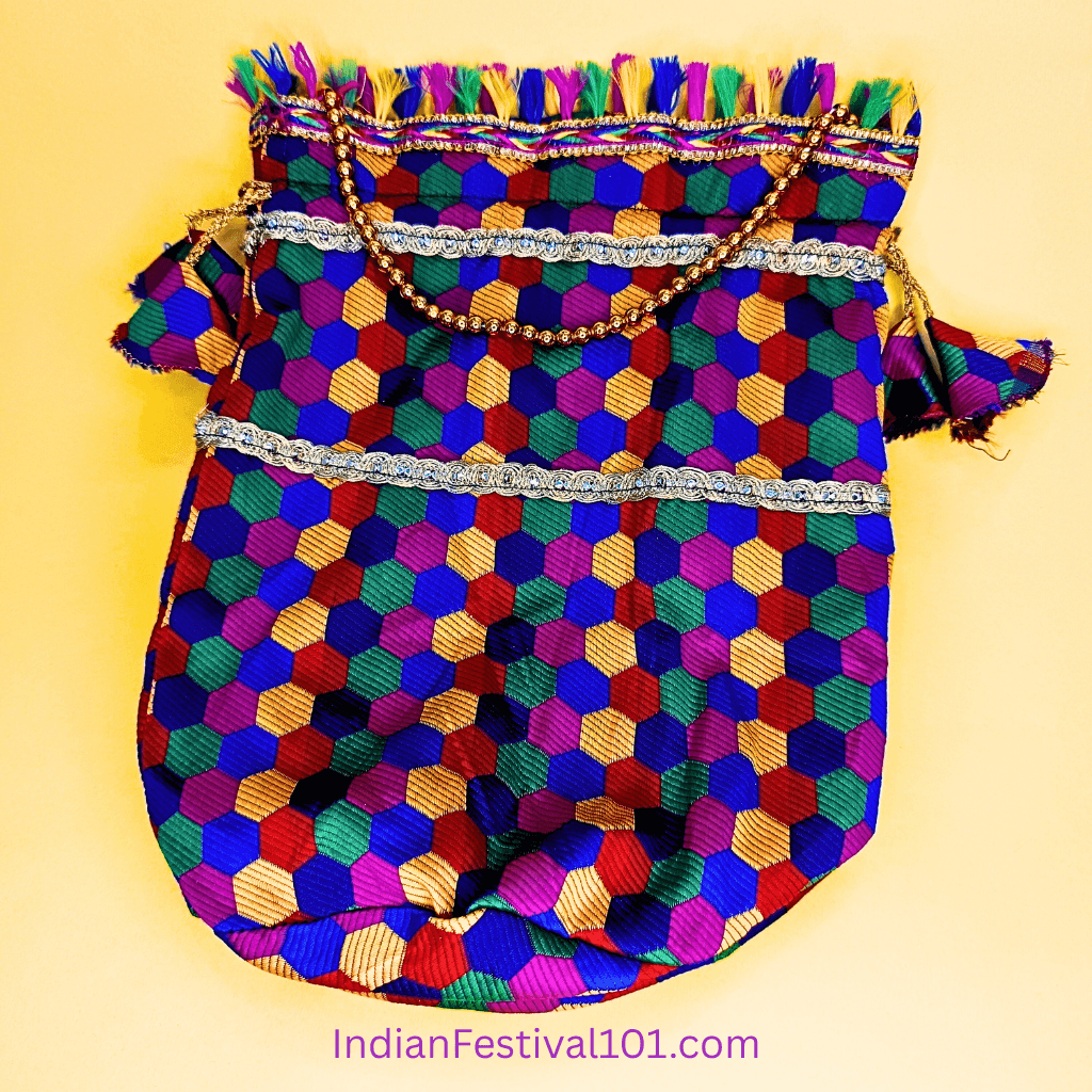 Vibrant Hexagonal Pattern Potli Bag with Golden Tassels 3 Vibrant Hexagonal Pattern Potli Bag with Golden Tassels - Image 3